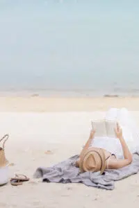 Take time to rest during the summer. Go to the beach, lie on a blanket, and read a book. You deserve this.