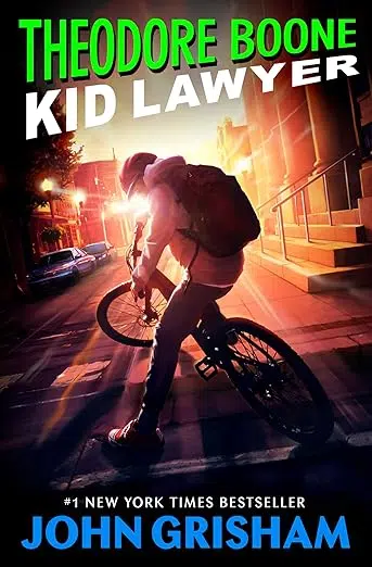 Book cover: male teen wearing backpack riding bike.