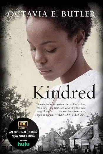 Book cover. A color picture of Black woman wearing white looking down toward black-and-white photo of log cabins with groups of Black people in the foreground.