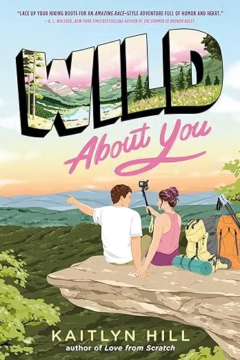 Book cover illustration of two campers with backpacks, walking sticks, and camera on a selfie stick, sitting on rock ledge.