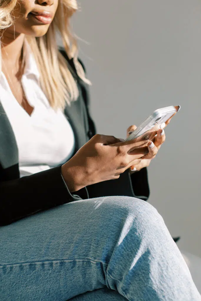 Woman using cell phone.
