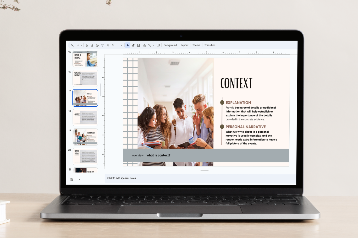 Three Heads teacher presentation for How to Write a Narrative Essay "Context" slide visible on laptop.
