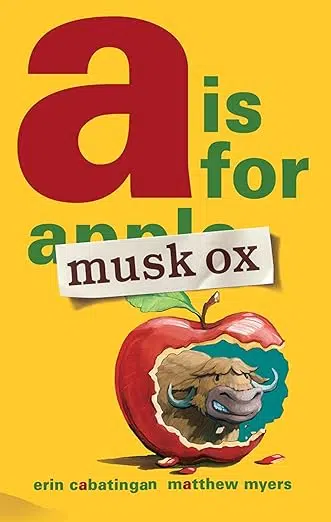 Book cover: A is for Musk Ox by Erin Cabatingan. "Musk Ox" taped over "apple." Musk ox revealed behind half eaten apple.