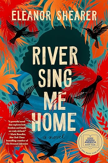 Book cover of “River Sing Me Home” by Eleanor Shearer. The artwork shows colorful tropical leaves in red, teal, and orange surrounding the silhouette of a woman’s head. Black birds fly across the scene, and a book club badge sits in the lower right corner.
