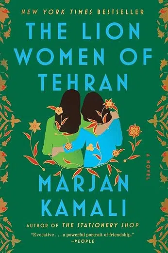 Book cover of “The Lion Women of Tehran” by Marjan Kamali. The illustration shows two women sitting close together with their backs to the viewer, one resting her head on the other’s shoulder. Floral vines in orange and gold frame the green background.